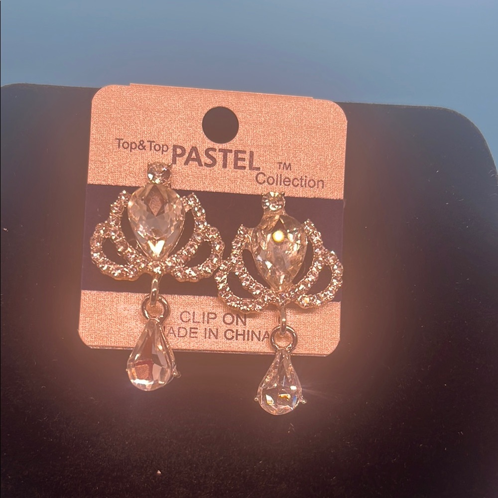 White Teardrop Earrings with Intricate Design